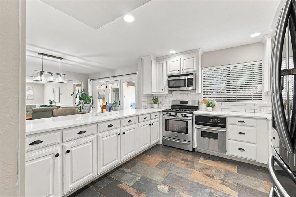 Lots of great kitchen updates. Gas range and built in microwave