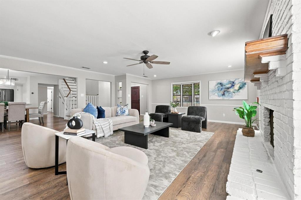 Comfortable living area with fireplace and plenty of natural light