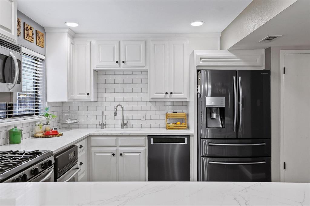 Lots of great kitchen updates. Gas range and built in microwave