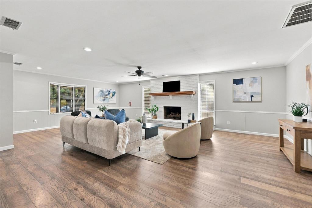 Spacious living room with cozy fireplace and open layout