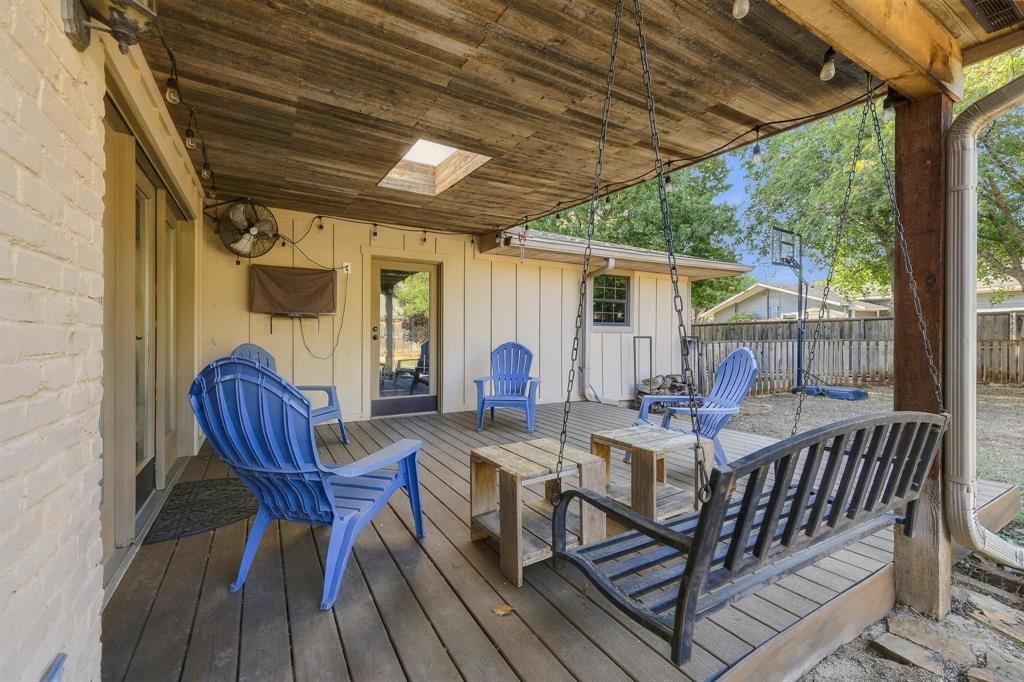 Backyard covered deck with Trex weatherproof deck boards