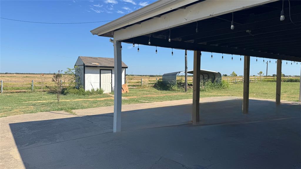 Covered patio or can use as a carport Covered patio or can use as a carport