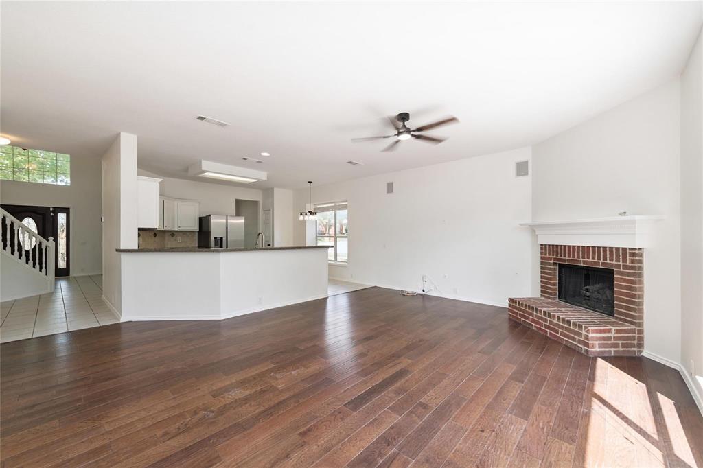 Wood-finish flooring throughout the main living space