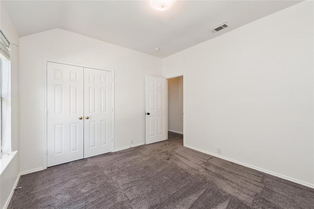 Vaulted ceiling with a flush-mount light fixture