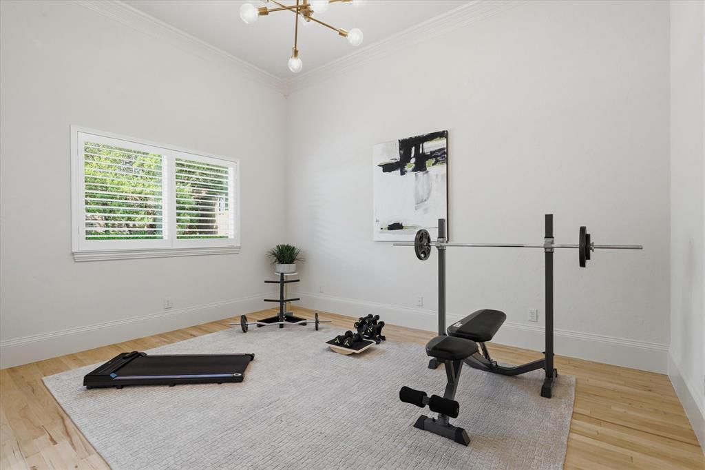 First floor guest bedroom is currently utilized as a home gym.