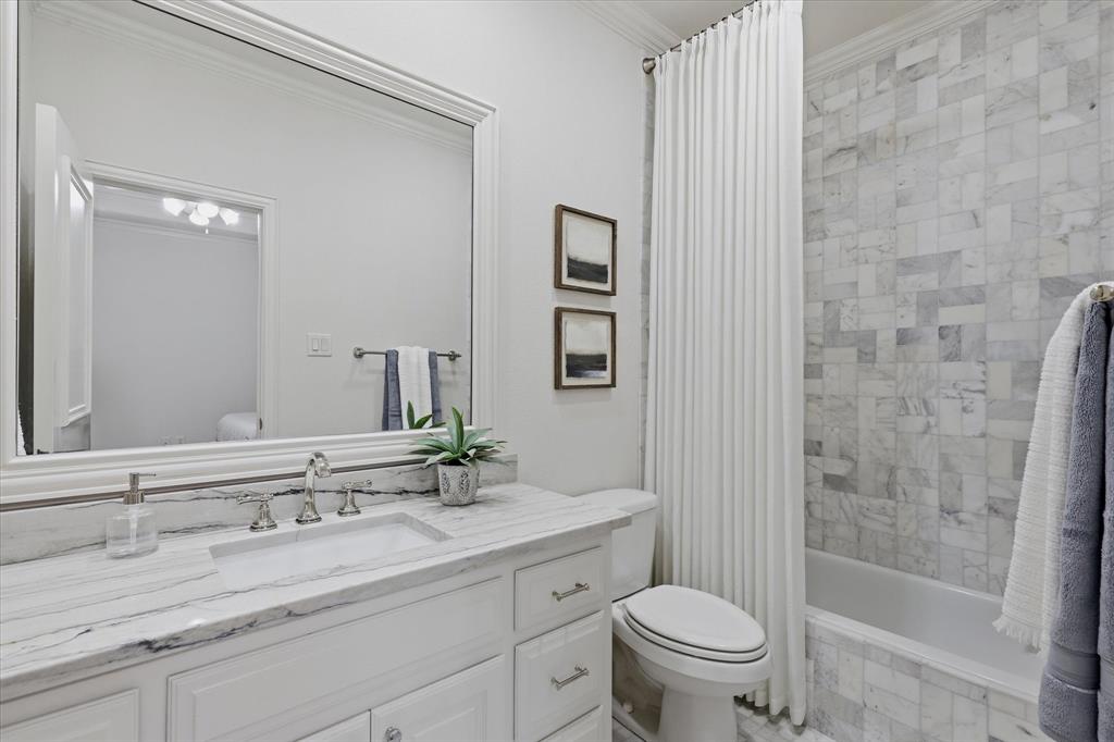 A beautifully updated ensuite bath completes this private upstairs bedroom suite.