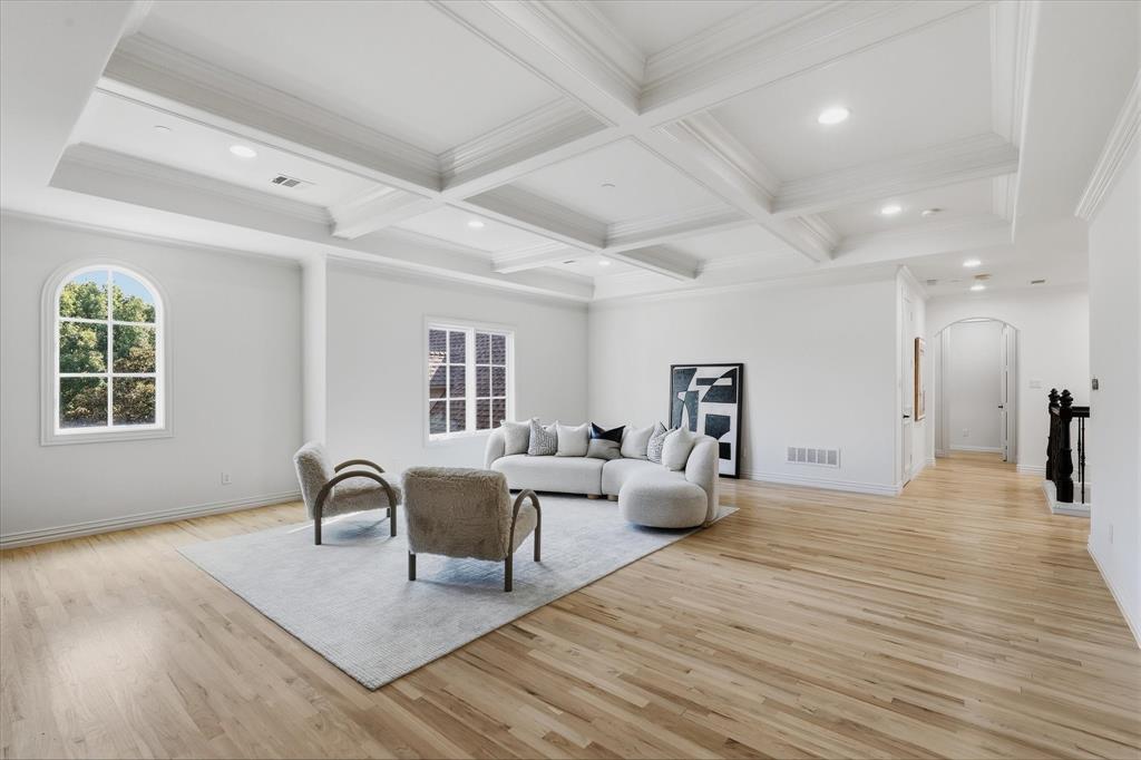 The generous upstairs living area provides flexible space for games, conversation and relaxation.