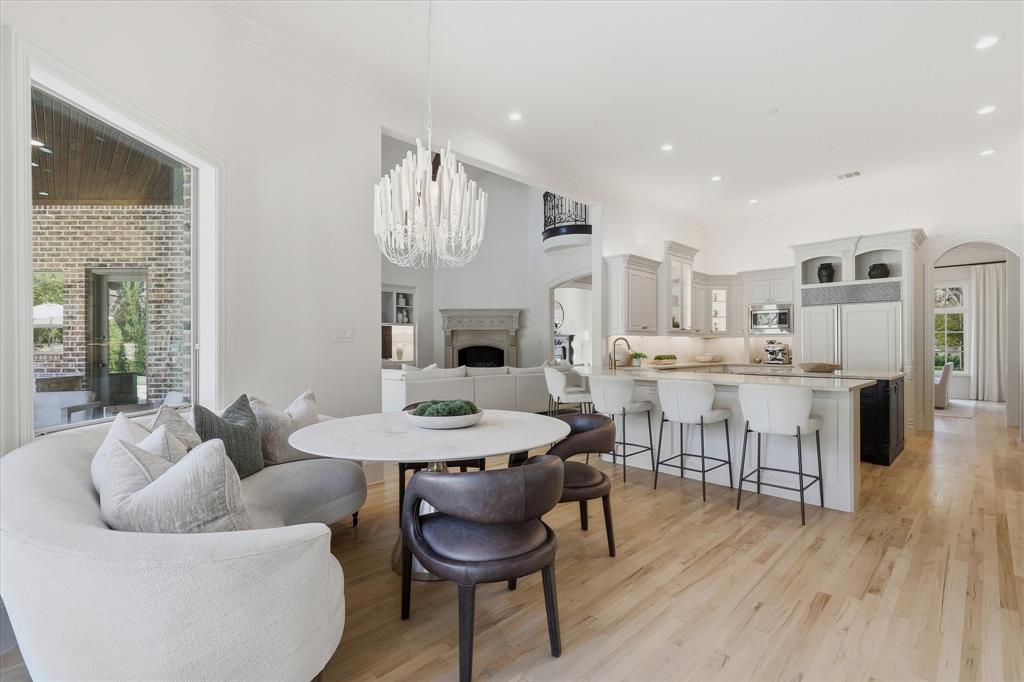 The breakfast area opens seamlessly to the kitchen and family room for relaxed everyday living.