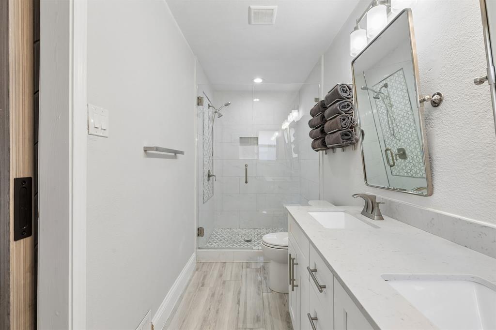 View 1 of large frameless glass shower