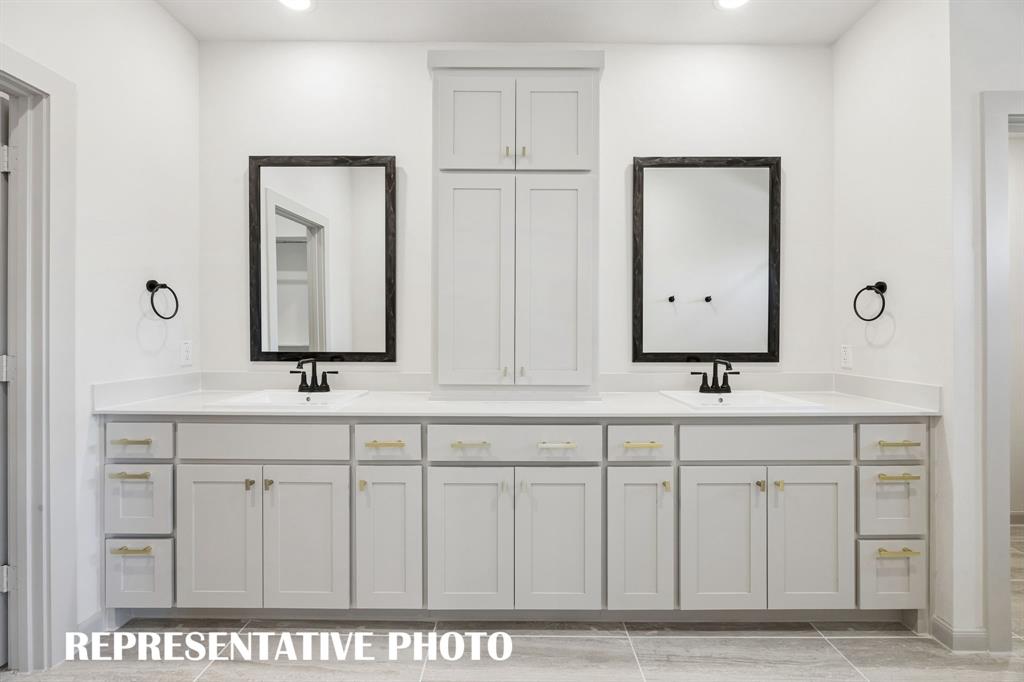 Plenty of space for two in this lovely owner's bath.  REPRESENTATIVE PHOTO