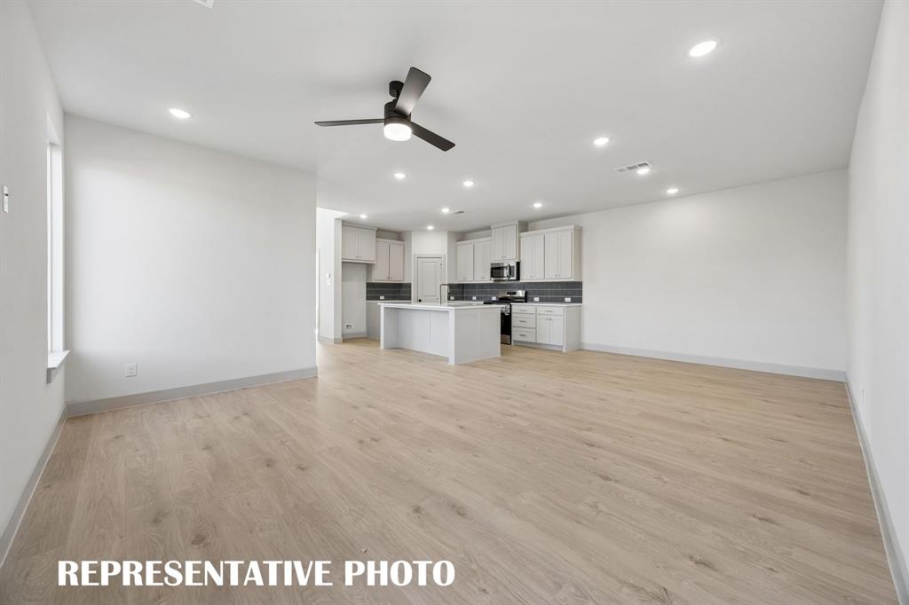 The entire family will love gathering in this chamring family room.  REPRESENTATIVE PHOTO