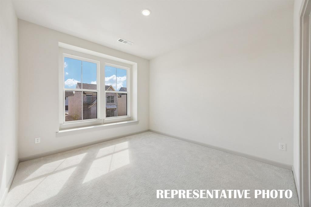 You'll find nicely sized secondary bedrooms in our Adelaide paln.  REPRESENTATIVE PHOTO