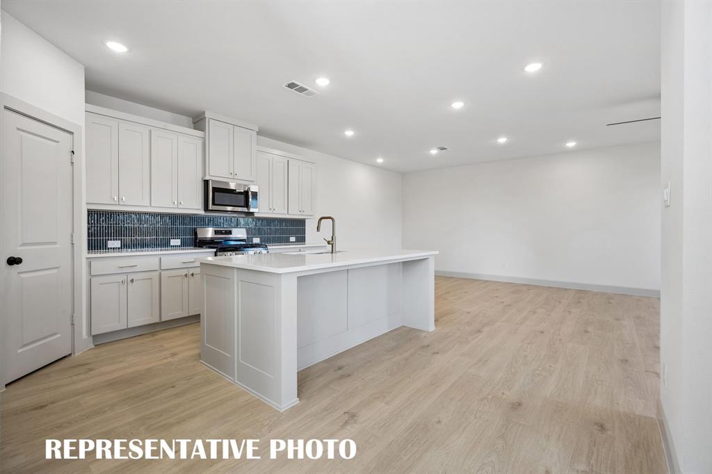 The chef in the family will never be left out of the party in this wonderful open concept floor plan. REPRESENTATIVE PHOTO The chef in the family will never be left out of the party in this wonderful open concept floor plan. REPRESENTATIVE PHOTO