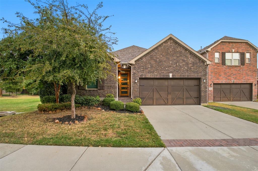 Brick exterior with a covered entry