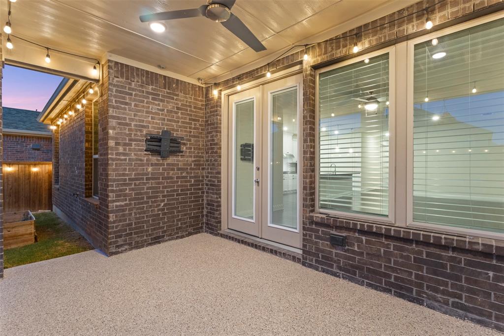 Covered patio featuring a ceiling fan, recessed lighting, and string lights