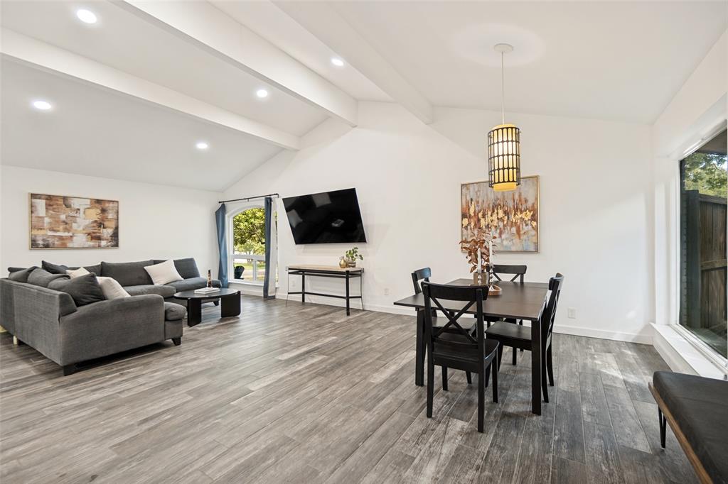 Vaulted ceilings with exposed beams and recessed lighting