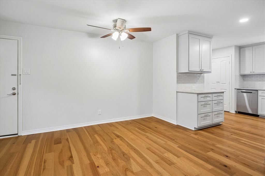 Living Area And Dining Area Lead To Kitchen