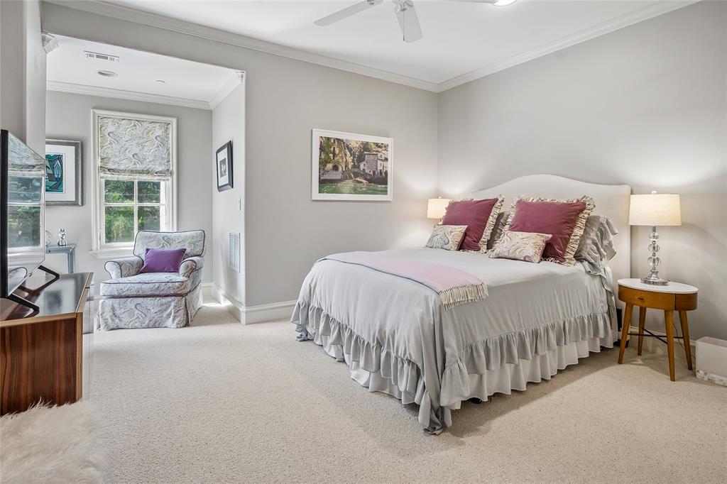 Bedroom site #4 Recessed window alcove with window, recessed lighting, and crown molding