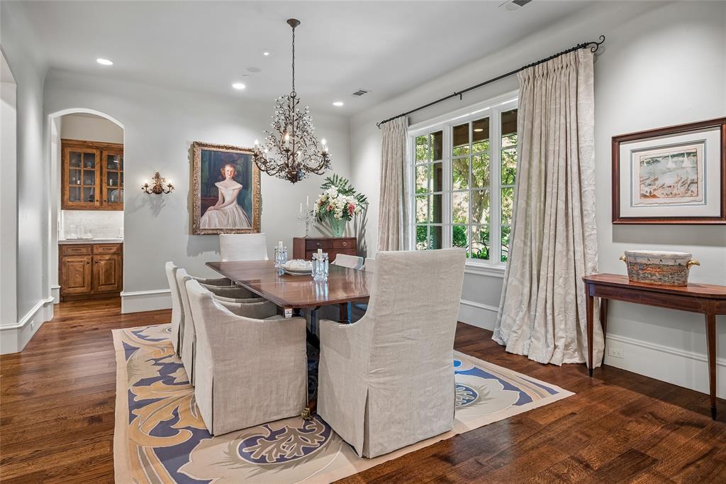 Hardwood flooring throughout, with a crystal chandelier and recessed lighting Hardwood flooring throughout, with a crystal chandelier and recessed lighting