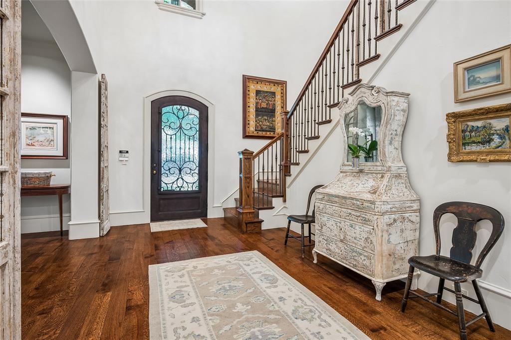 Arch top entry door with ornate wrought iron detailing Arch top entry door with ornate wrought iron detailing