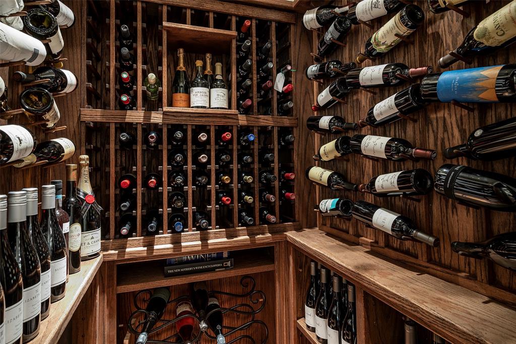 Built-in wood wine storage with individual bottle slots and horizontal displays