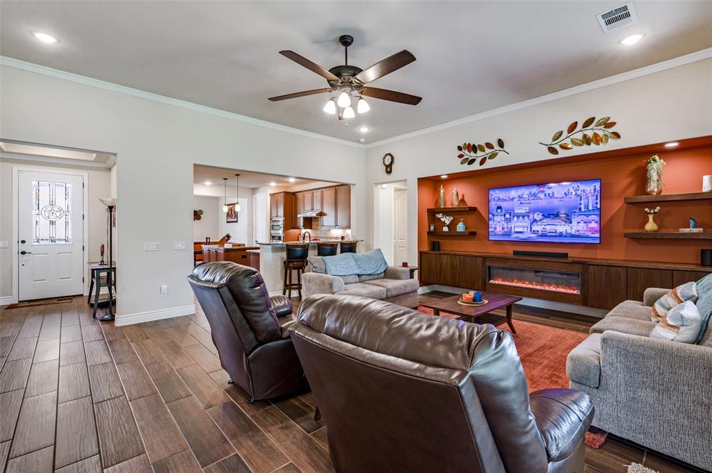 Feature wall with large built in, fireplace and open shelving