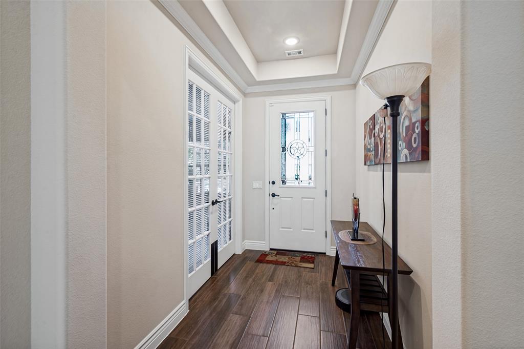 Entry shows French Doors to Office or Den