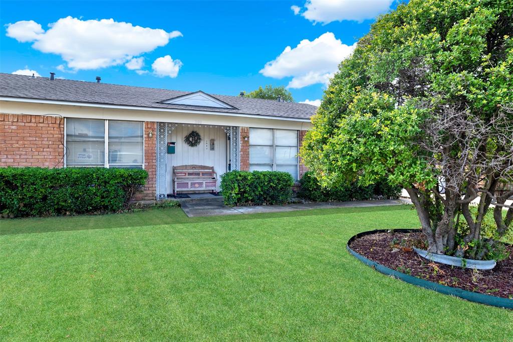 Ranch-style home with a front lawn Ranch-style home with a front lawn