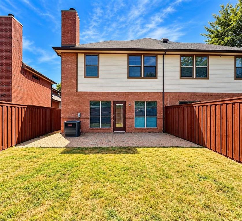 Brick exterior with a second story of horizontal siding