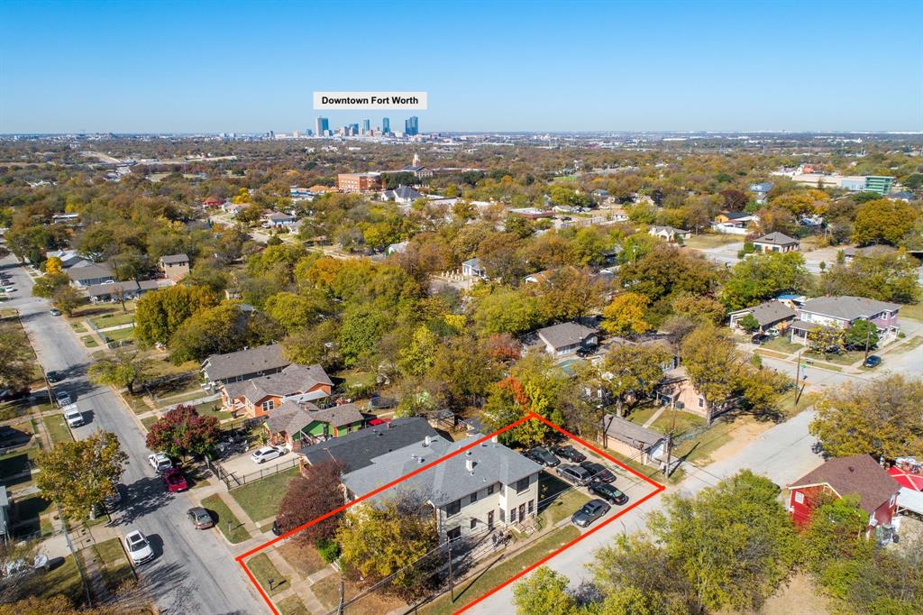 Aerial perspective highlighting the property's location within a tree-lined neighborhood