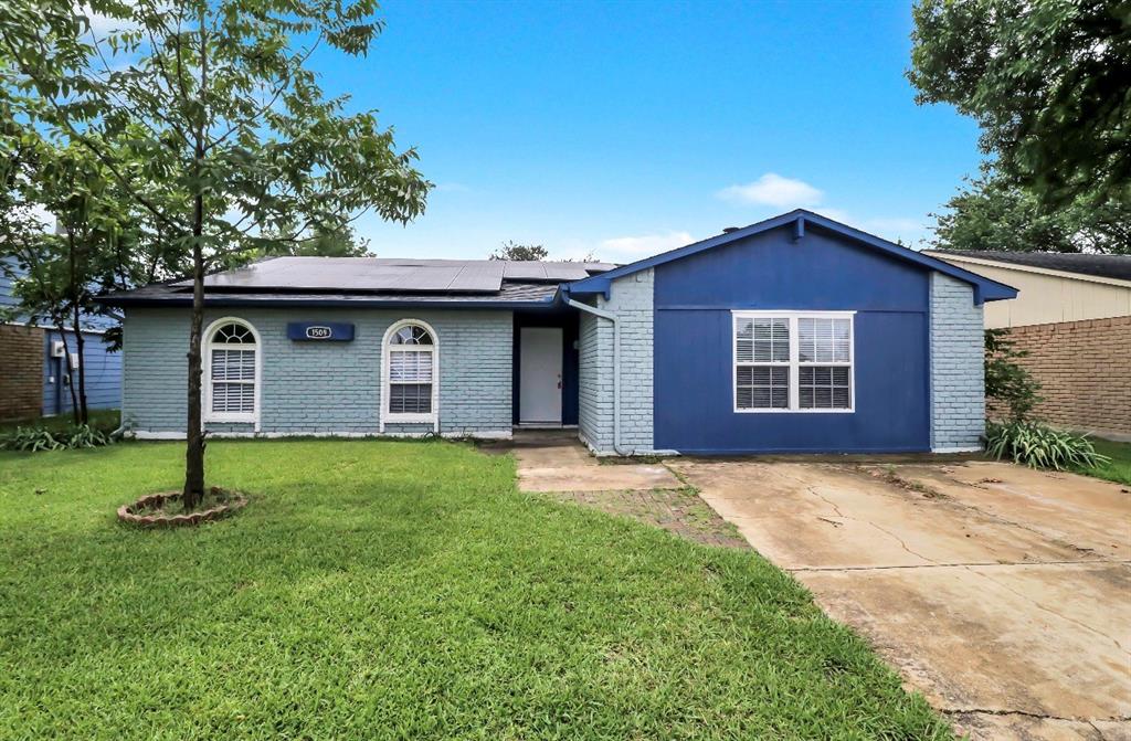 Brick exterior with blue siding accents