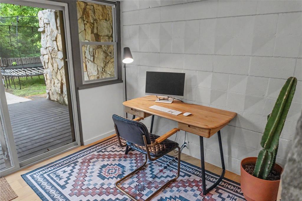 Office nook on the lower level with sliders out to the patio