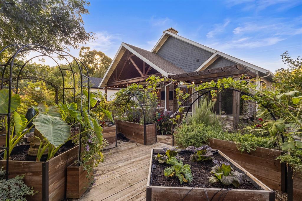 Back of Structure and raised vegetable/herb garden