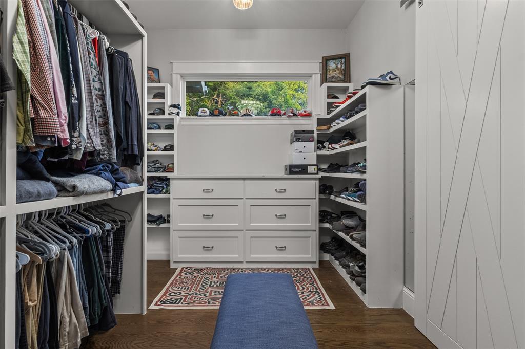 Primary Bedroom closet with built ins