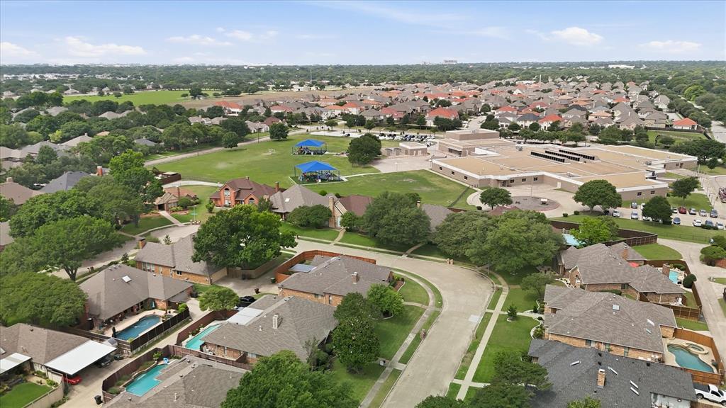 Residential neighborhood with mature trees and a curvilinear street layout