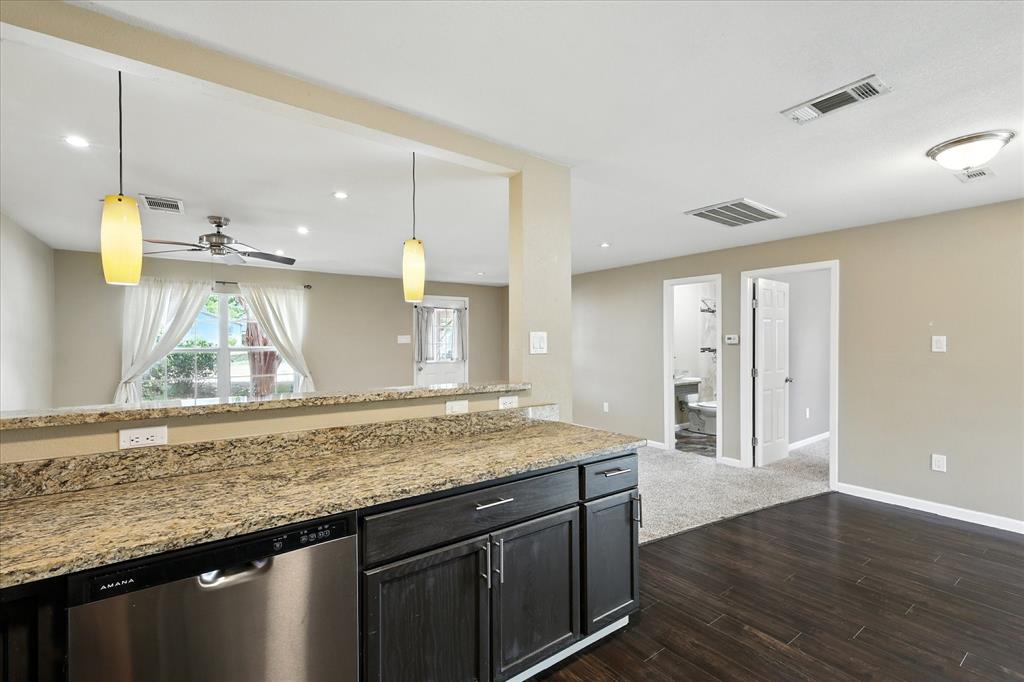 View of secondary bedroom off kitchen