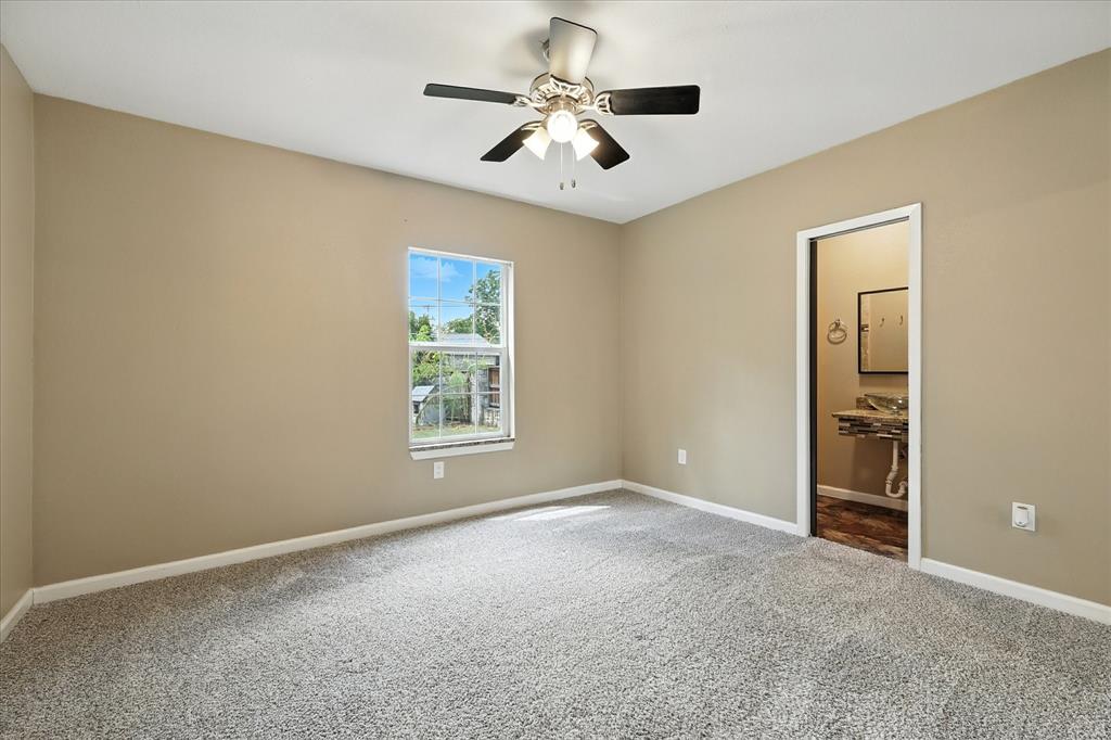 Primary bedroom at back of home with ensuite bath.