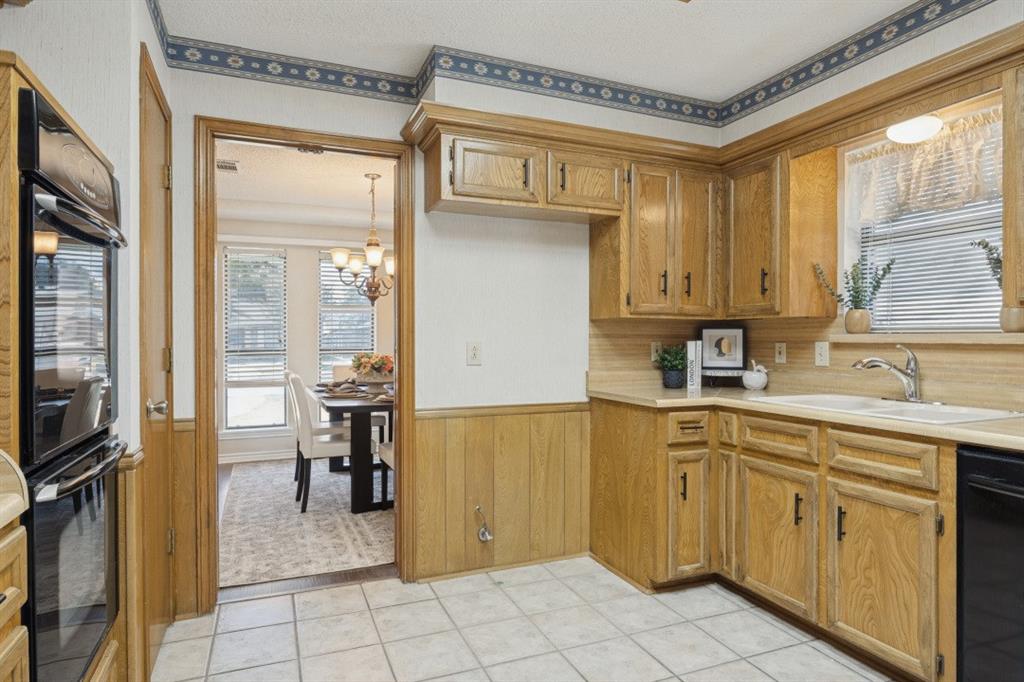 The kitchen leads directly into the dining room.