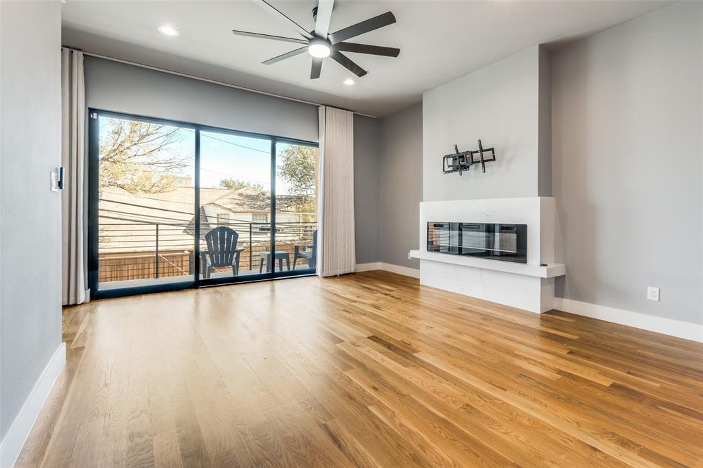 Wood-finish flooring, recessed lighting, and a ceiling fan
