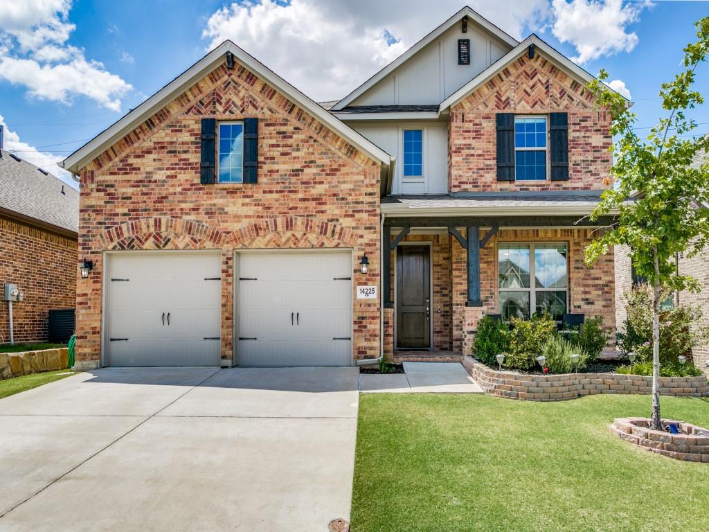 Custom landscaping & one of the most pristine lawns in the neighborhood!