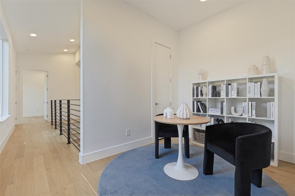 Upstairs loft can be additional office, workout area, or seating area.