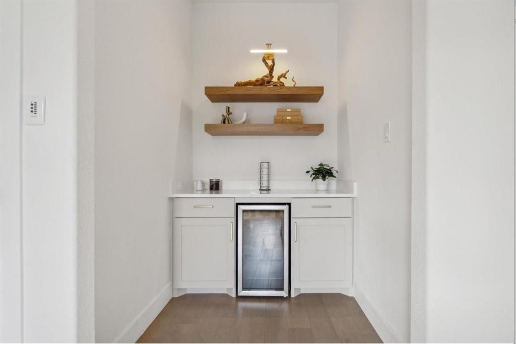Integrated beverage cooler with frosted glass door
