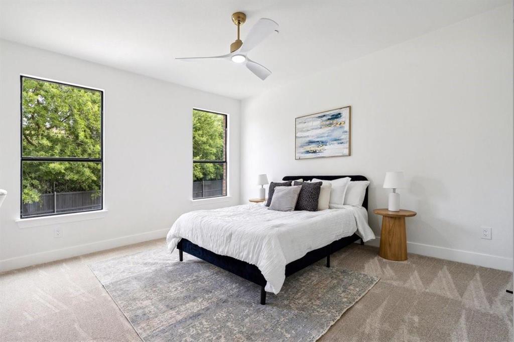 White walls and neutral carpet flooring