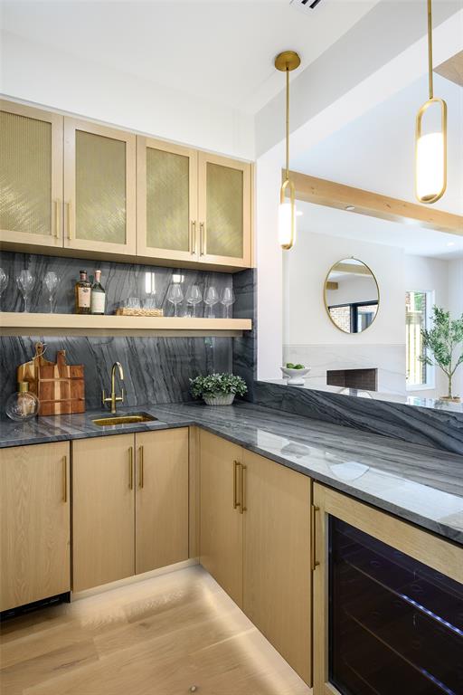 Wet bar with undercounter beverage center, icemaker and designer undermount sink