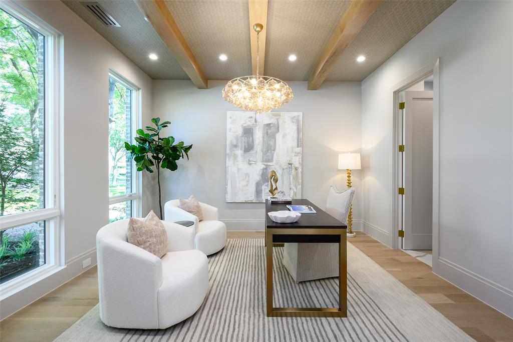 Downstairs guest suite/study with large walk-in closet and full bath