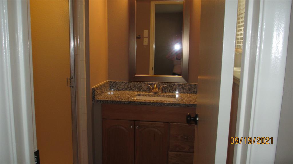 Master bath with stand up shower, granite countertop