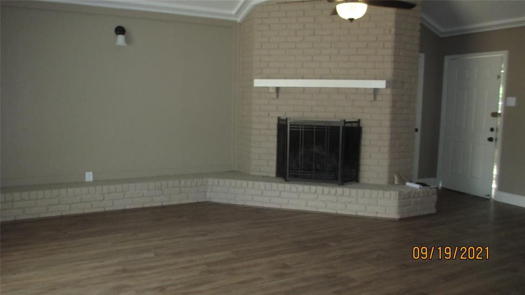 Great fireplace with gas logs, designer paint and wood floors Great fireplace with gas logs, designer paint and wood floors