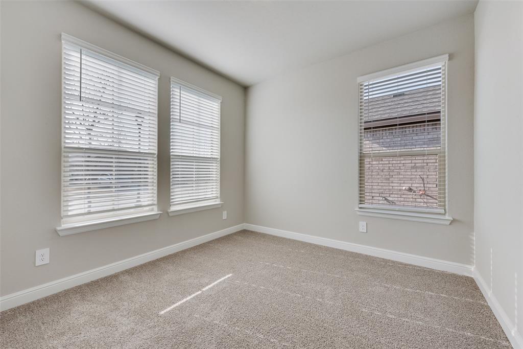 Empty room with carpet flooring