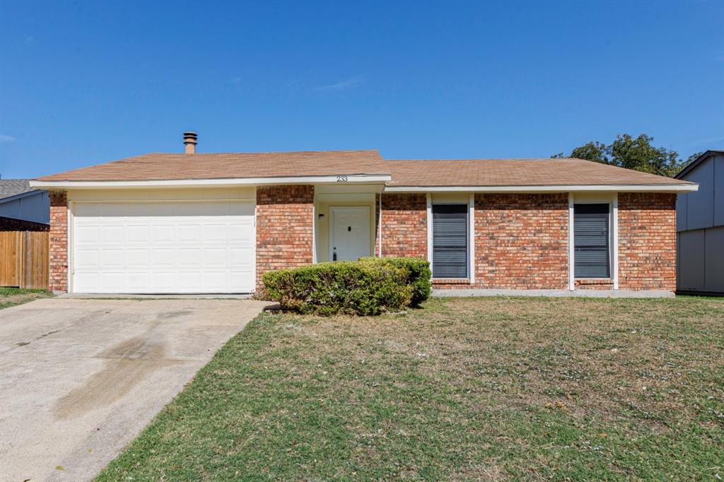 Welcome Home! Single-story exterior featuring a brick facade, attached two-car garage, and asphalt shingle roof