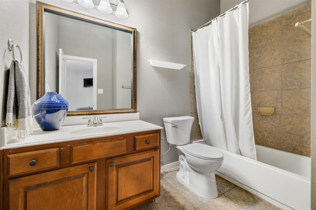 This bathroom is upstairs just outside of the bedroom.